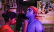 Hindu devotees dance as they participate in the Lal Kach (Red Glass) festival during the l...