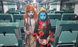 Devotees paint their faces as Kali and Shiva while collecting alms to celebrate the Shiva...