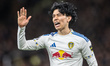 Ao Tanaka of Leeds United reacts during the Premier League match between Manchester United...