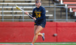 Caroline Byrd of the Michigan Wolverines possesses the ball during an NCAA women's lacross...