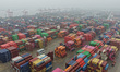 Containers are stacked at Longtan Container Terminal in Nanjing Port in Nanjing, Jiangsu P...