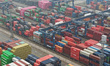 Containers are stacked at Longtan Container Terminal in Nanjing Port in Nanjing, Jiangsu P...