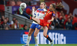 Irene Paredes of Spain controls the ball while pressured by Alessia Russo of England durin...