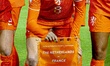 Netherlands player Wieke Kaptein holds the pennant during the European qualifying match be...