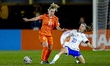 Victoria Pelova of the Netherlands and Anaele Le Moguedec of France compete during the Eur...