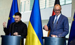 German Chancellor Friedrich Merz and Ukrainian President Volodymyr Zelensky attend a press...