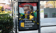A devastated election poster with Hungarian Prime Minister Viktor Orban is seen at a bus s...