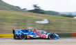 Kevin Magnussen (DEN), Raffaele Marciello (SUI), and Dries Vanthoor (BEL) drive the #15 BM...