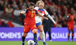 Ona Battle of Spain is under pressure from Lauren Hemp of England during the FIFA Women's...