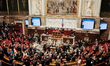 Members of Parliament applaud former French hostages from Iran ahead of a session of quest...
