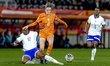 France player Sandy Baltimore and Netherlands player Wieke Kaptein during the European qua...