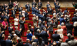 French MPs applaud former French detainees in Iran, Benjamin Briere, Louis Arnaud, and Oli...