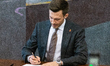 Malte Larsen of the Danish People's Party attends the signing ceremony for new members of...