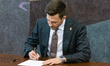 Malte Larsen of the Danish People's Party attends the signing ceremony for new members of...