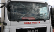 The windscreen of a Nova Poshta truck is cracked following a missile strike in Dnipro, Ukr...