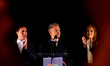 Hungary's newly elected Prime Minister Peter Magyar delivers his victory speech alongside...