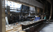 An assembly hall at an academic institution is damaged following a drone strike in Dnipro,...