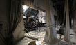 An assembly hall at an academic institution is damaged following a drone strike in Dnipro,...