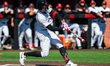 Charlie Meglio of the Rutgers Scarlet Knights swings the bat during an NCAA baseball game...