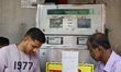 Customers receive fuel at a station in Dhaka, Bangladesh, on April 15, 2026. 