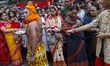 Hindu devotees perform ritual body-piercing and suspension during Charak Puja on April 14,...