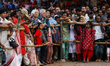 Hindu devotees perform ritual body-piercing and suspension during Charak Puja on April 14,...