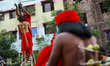 Hindu devotees perform ritual body-piercing and suspension during Charak Puja on April 14,...