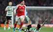 Gabriel Martinelli of Arsenal dribbles past Luis Suarez of Sporting Clube de Portugal duri...