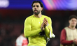 David Raya of Arsenal thanks the supporters after the UEFA Champions League Quarter Final...
