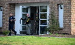 Federal agents and the Metropolitan Police Department visit a property near the Mayfair Ma...