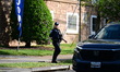 Federal agents and the Metropolitan Police Department visit a property near the Mayfair Ma...