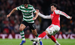 Martin Zubimendi of Arsenal and Trincao of Sporting CP compete during the UEFA Champions L...