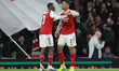 Cristhian Mosquera hugs William Saliba of Arsenal during the UEFA Champions League Quarter...