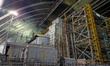 The New Safe Confinement, installed in 2016, protects the remains of Reactor 4, destroyed...