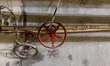 Technical water pipes are equipped with red valves at the Chornobyl Nuclear Power Plant in...