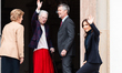 Queen Margrethe of Denmark and Queen Mary of Denmark wave to members of the public on the...