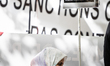 Dozens of demonstrators and supporters of the Palestinian cause gather near the National A...