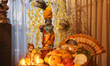 A traditional Vishu kani setting with an idol of Lord Krishna is seen in a home during the...