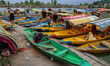 A Kashmiri boatman repairs his boat on the banks of Dal Lake in Srinagar, Jammu and Kashmi...