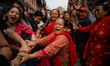 Newari women pull Lord Bhairav's chariot in Bhaktapur, Nepal, on Thursday. Biska Jatra, ce...