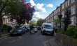 General view of Lowfield Road in Kilburn, London, on April 16, 2026. Houses are vandalized...