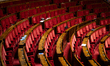 An illustration photo shows empty seats of the hemicycle of the National Assembly in Paris...