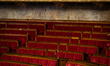 An illustration photo shows empty seats of the hemicycle of the National Assembly in Paris...
