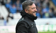 Jon Brady, manager of Port Vale FC, smiles during the Sky Bet League 1 match between Peter...