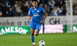 Brandon Khela of Peterborough United moves forward with the ball during the Sky Bet League...