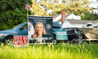 Signs promoting both sides of Virginia's redistricting referendum vote in Norfolk, Virgini...