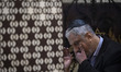 An Iranian-Jewish man participates in a prayer ceremony commemorating the death of Iran's...