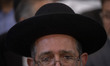 Iranian-Jewish Rabbi Younes Hamami Lalehzar participates in a prayer ceremony commemoratin...