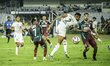 A tense moment near the Punjab FC goal area during a match between Mohunbagan Super Giant...