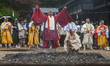 MIYAJIMA, JAPAN - APRIL 15: 
 The Chief Priest of Daisho-in Temple stands barefoot on smo...